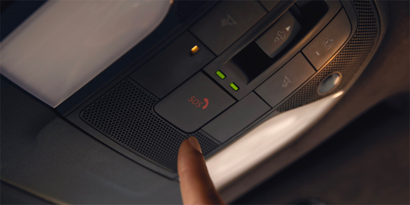 close up of emergency services button inside infiniti